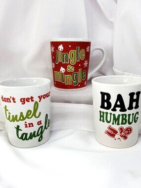 3 Christmas-Themed Ceramic Mugs With Festive Sayings & Graphics